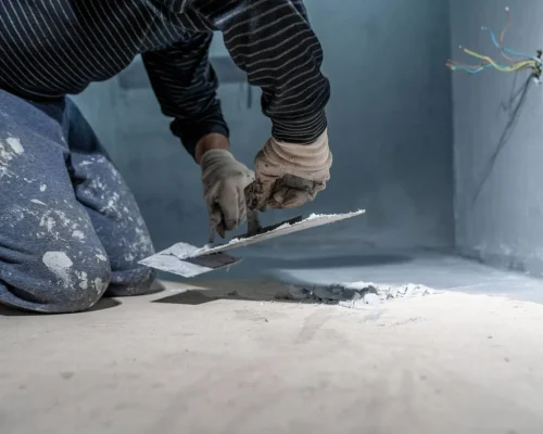 Bathroom waterproofing membrane installation before floor tiling works